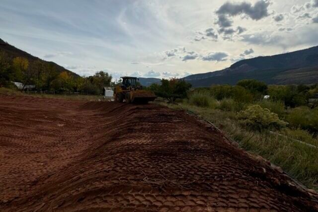 a tractor on a dirt road