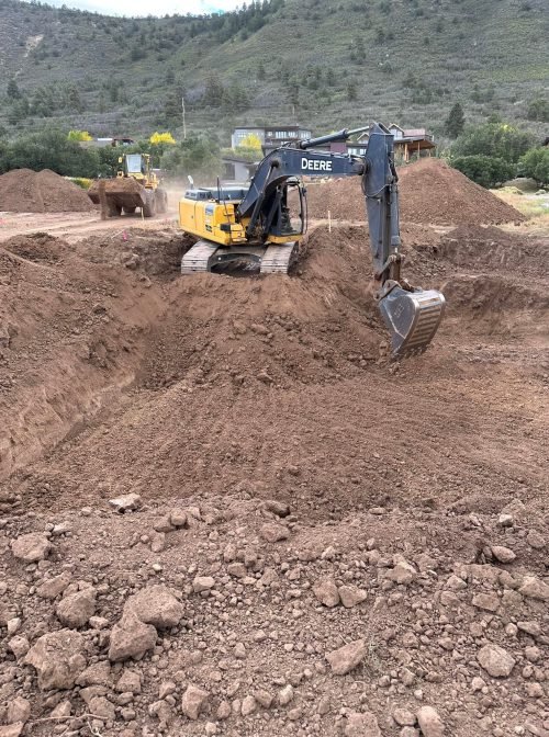 480444780_1172904328174806_9123740325983245743_n a construction vehicle digging a hole in dirt