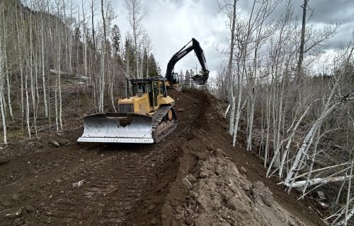 490446615_1224169449714960_7553231121697924047_n a bulldozer on a dirt road